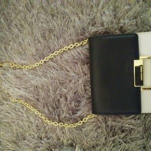 Ivanka Trump clutch with shoulder strap